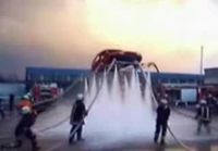 Firemen Lift Car With Hoses