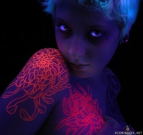 Blacklight tattoo - invisible unless under a blacklight 