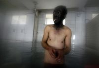Kiinalainen hiilikaivosmies kylvyssä