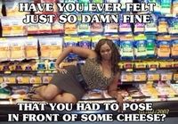 Posing in front of cheese