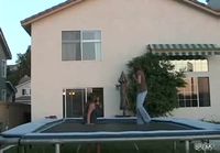 Girl falls through trampoline
