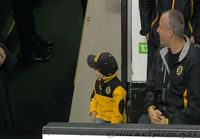  Young Fan Fist Bumps Boston Bruins after their Pregame Warm Up
