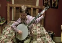 8-vuotiaat soittaa banjoa ja viulua