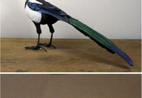 Paperista ja puusta tehtyjä lintuja