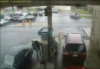 Woman push firebutton by error at gas station